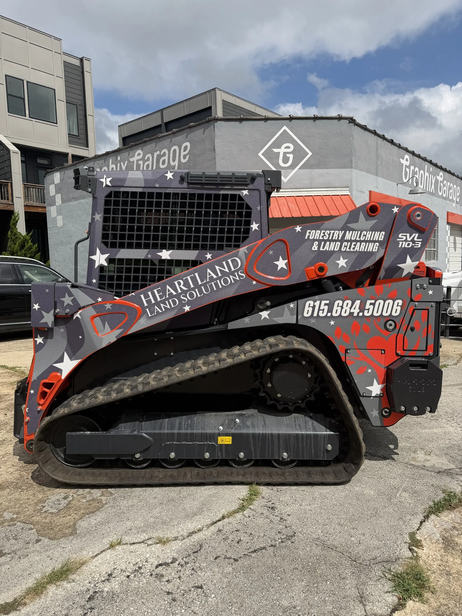 Heartland Land Solutions Kubota SVL110-3 compact track loader wrap by Graphix Garage Columbia TN