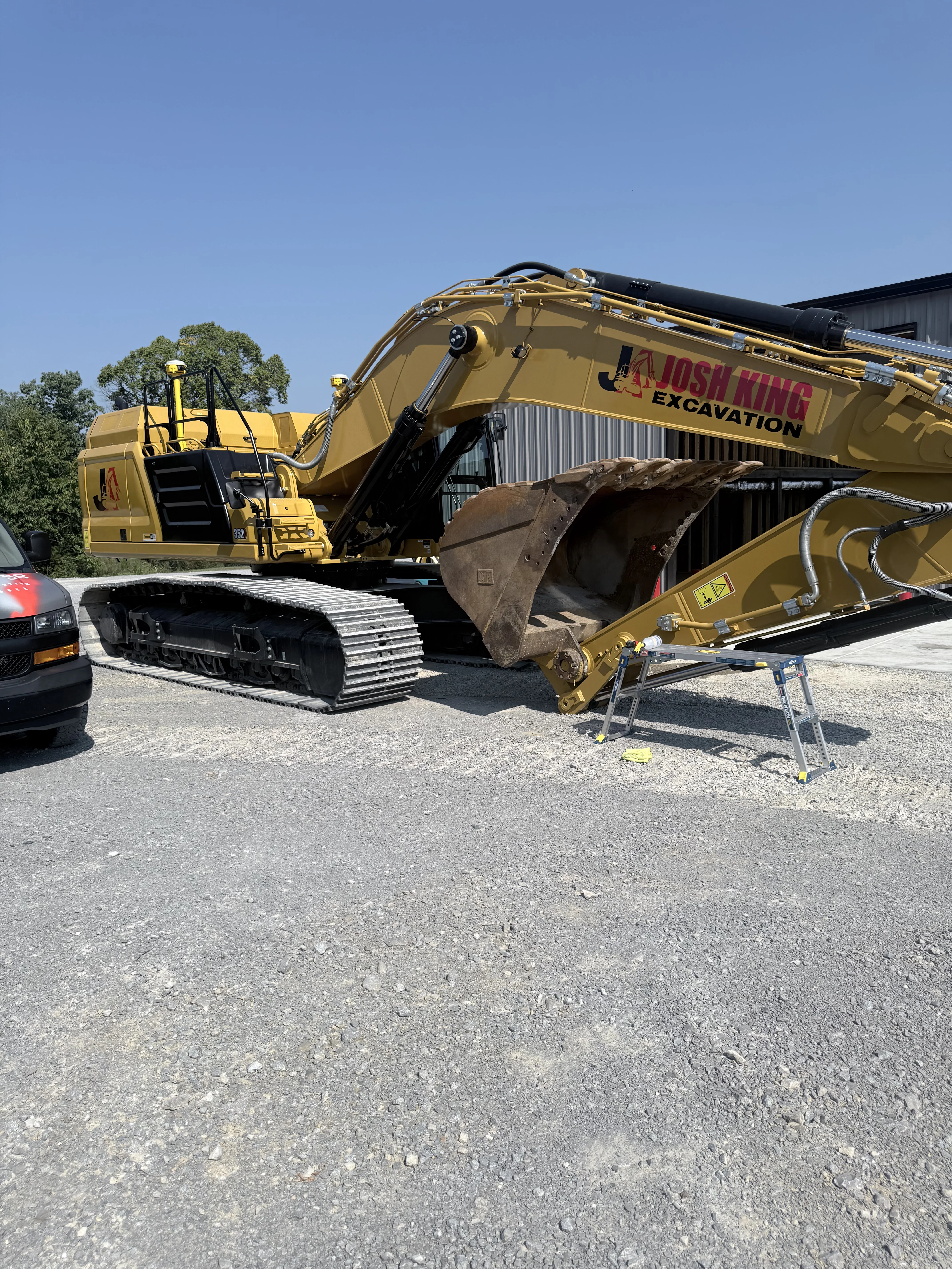 Josh King Excavation excavator boom graphics by Graphix Garage