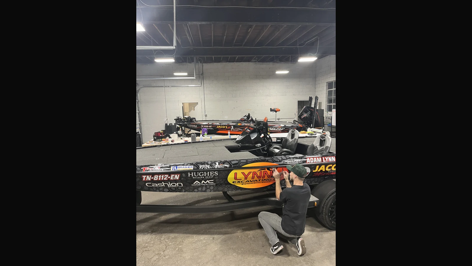 LynMom / Lynn Excavating boat wrap in shop