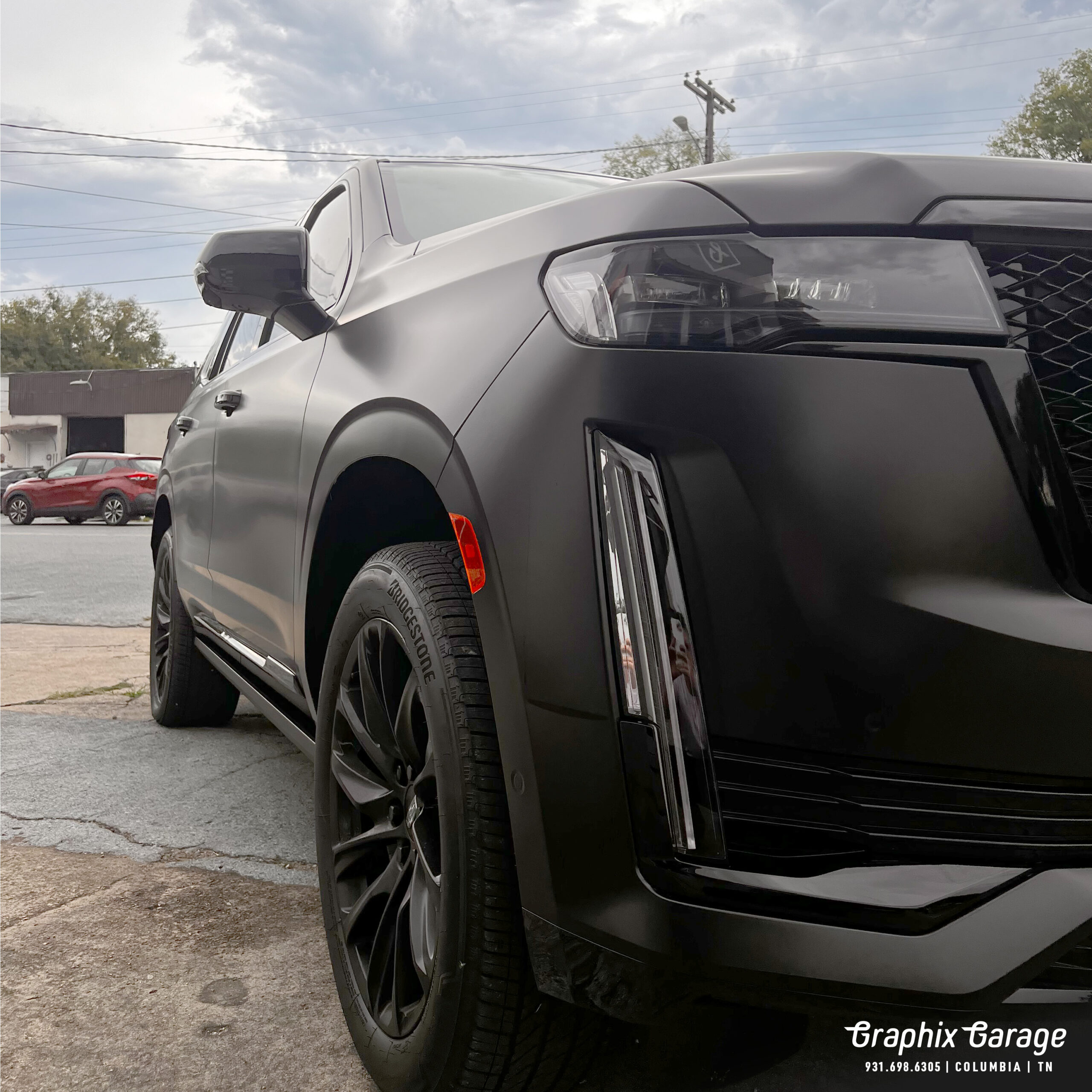 Cadillac satin black color change wrap