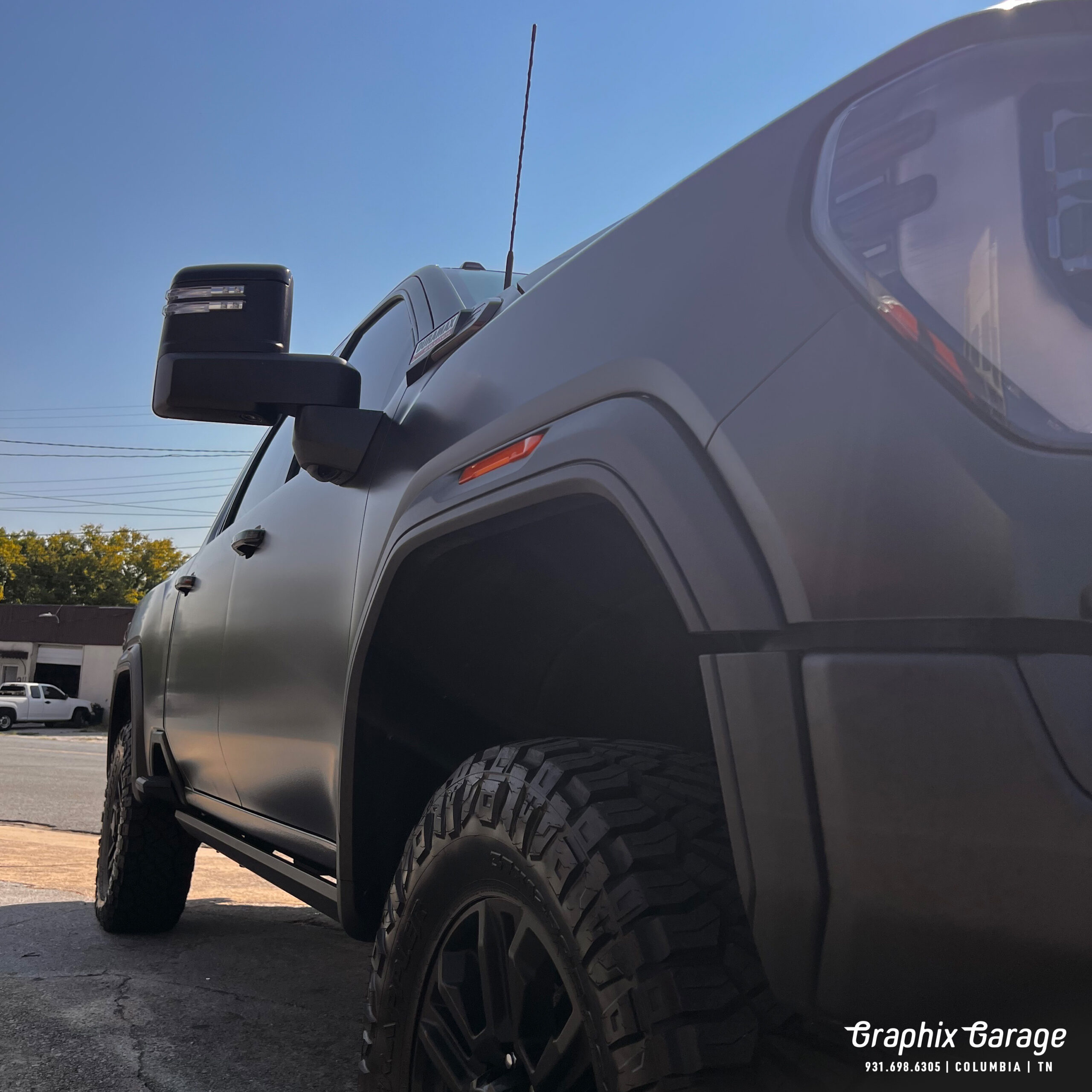 satin black vehicle wrap truck gmc