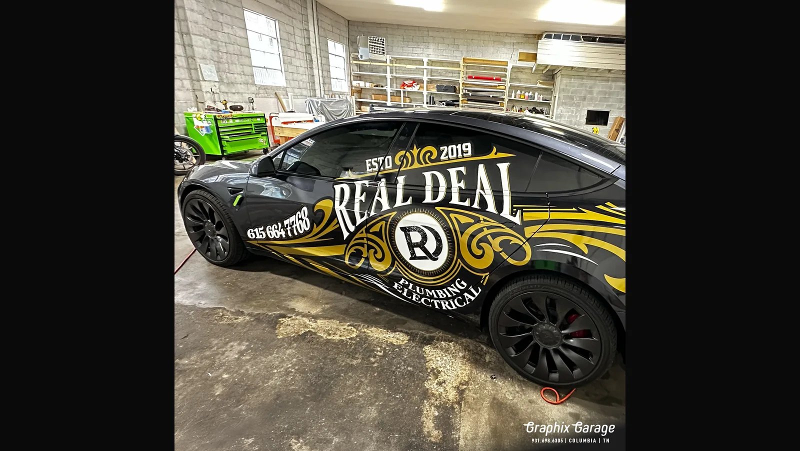 Real Deal Plumbing Tesla wrap by Graphix Garage
